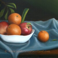 Oil painting of some oranges and apples in a bowl on a table/cloth.